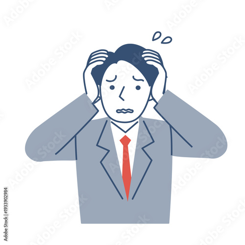 困った表情の男子学生の上半身