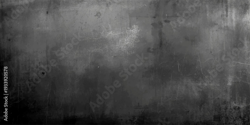 A dark aged grunge metal plate background with a rough textured grey concrete surface and vintage black stone pattern for a dirty industrial design backdrop
