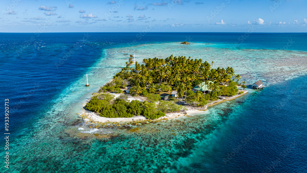 © Westend61 - Aerial view of small island at Avatoru pass, Rangiroa, French Polynesia