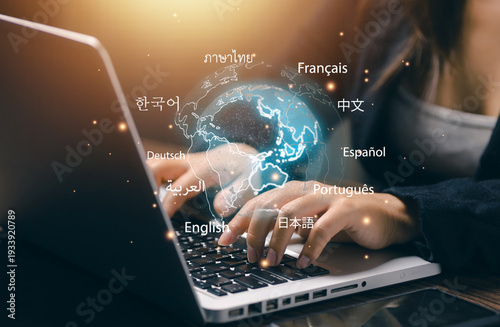 Global multilingual communication concept with laptop and digital world map. Online translation, language learning, international business communication and localization technology network.