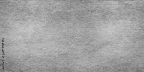 A blank vintage grey paper texture with a rough concrete wall pattern and light grunge cement surface backdrop for an old textured material design