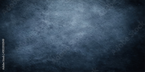 Vintage dark blue grunge wall background with a dirty texture and smoky black fog patterns for a moody artistic design wallpaper