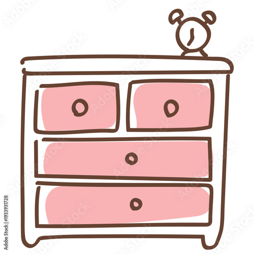 天板には目覚まし時計の乗った手書きのかわいいチェスト