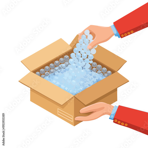 Hands packing a cardboard box with protective bubble material