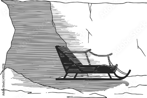 vintage wooden sled resting against snowy rock wall in winter landscape