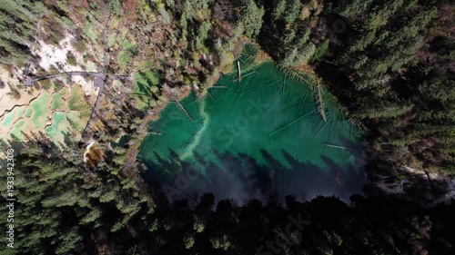 Drone view of Shenxianchi Scenic Area in Sichuan, China, near Jiuzhaigou and Huanglong, peaceful and clean water in pond among mountains, 4k real time footage travel concept.