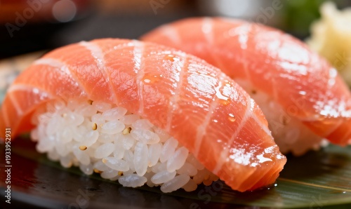 Fresh Salmon Nigiri Sushi with Glistening Texture on Plate