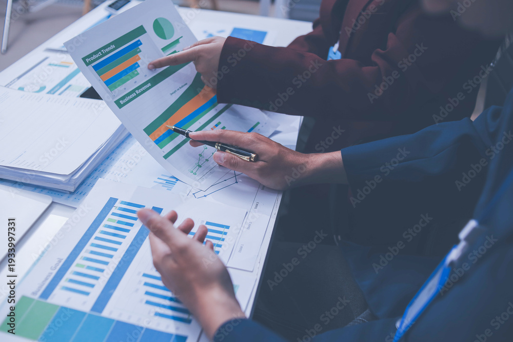 Fototapeta premium Accounting company provide finance and taxation planning for profitable cash flow, Auditor and accountant team working in office, analyze financial data and accounting record with calculator