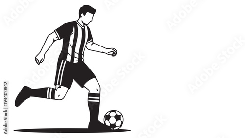 Silhouette of a footballer kicking a ball in action.