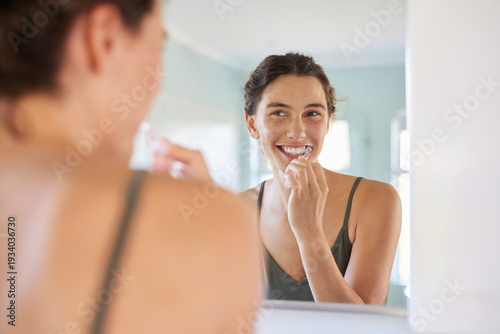 Photos Happy woman brushing teeth during morning routine