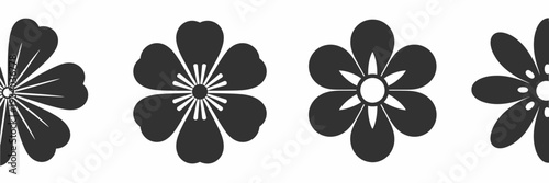 Four distinct black silhouettes of flowers with white details on a white background