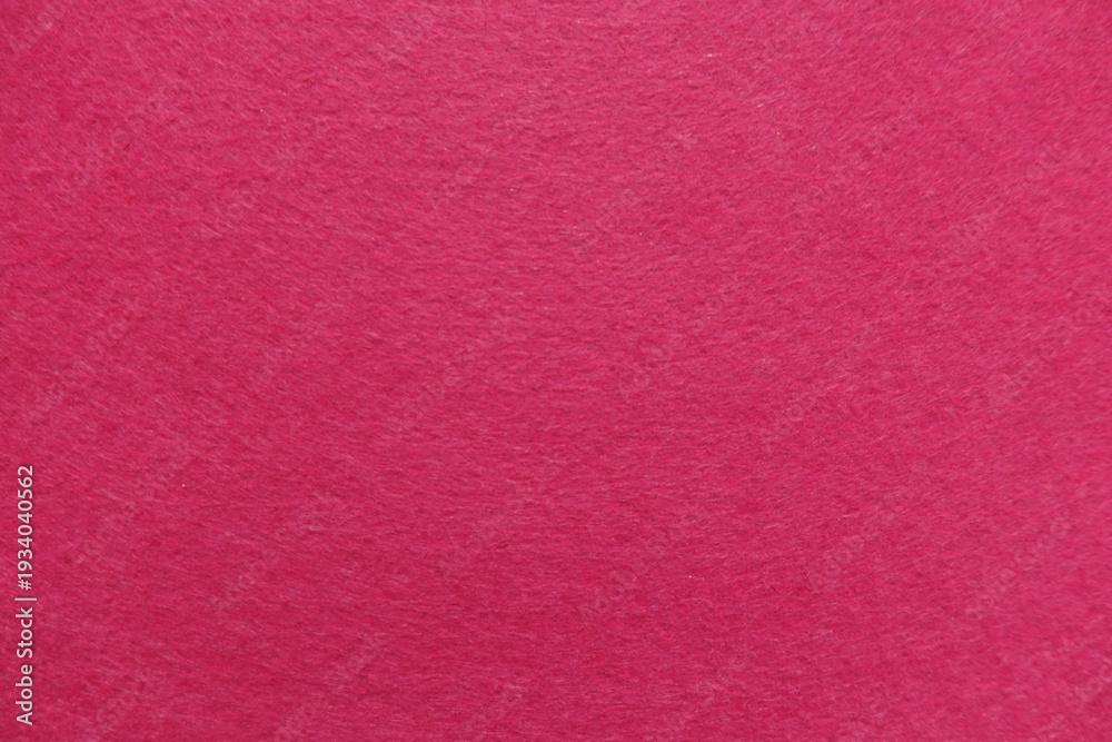 Fototapeta premium Close up of vibrant pink felt fabric texture