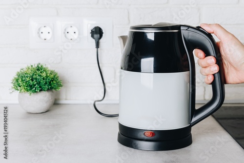Konstfotografi Modern Electric Kettle on a Kitchen Counter with a Minimalist Design and Indoor