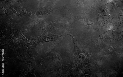 Texture of dark gray decorative plaster or concrete with vignette. Abstract grunge background for design. Black smooth textured wall background