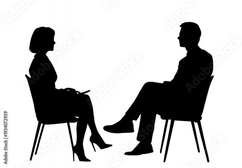 two people in silhouette having a discussion