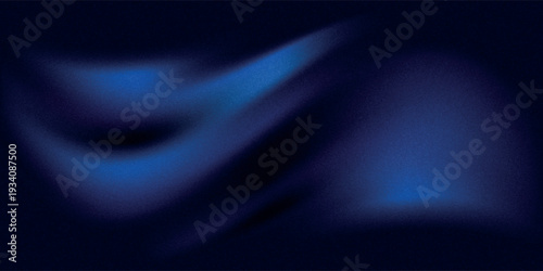 Abstract blue black background. Navy blue silk satin texture background. Beautiful soft wavy folds on shiny fabric. Dark elegant background for your design.