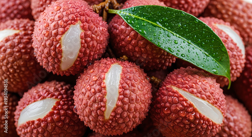 Fresh lychee fruit with green leaves