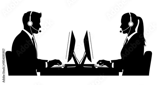 Two office workers wearing headsets sitting at a desk with computers