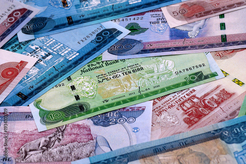 Wallpaper Mural Ethiopian birr money bills pile on table. Ethiopia banknotes of ETB currency close up. Torontodigital.ca