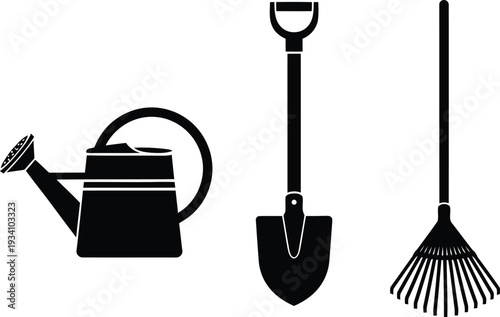 Black silhouette of watering can shovel and rake gardening