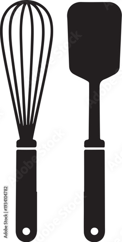 Black kitchen utensils whisk and spatula