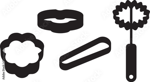 Black silhouette cookie cutters and pastry brush baking