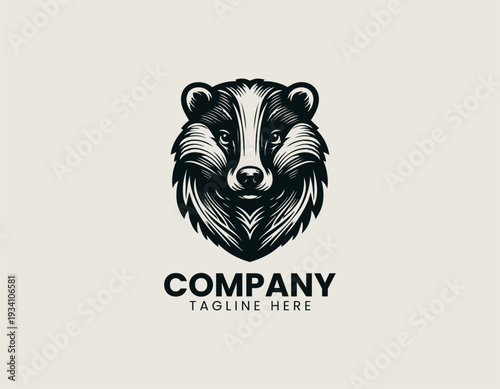 Detailed badger head in symmetrical frontal view is presented as bold monochrome vector logo on clean white background