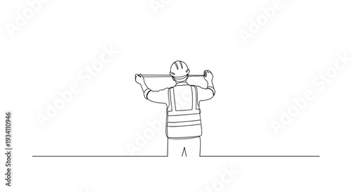 Man Carrying Large Object on Shoulders.