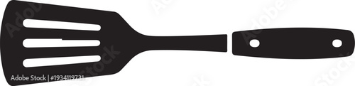 Black spatula with three prongs and handle holes kitchen utensil