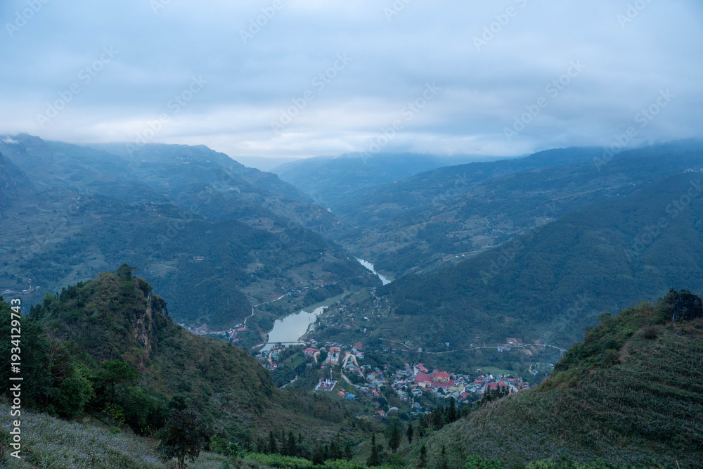 Fototapeta premium Foggy hills covered with forest