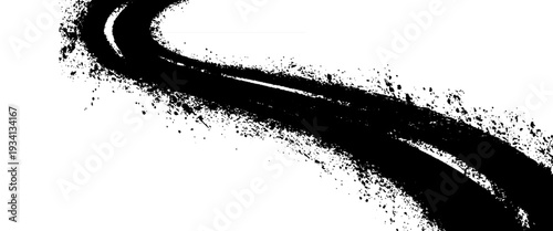 Black ink splatter forming a curved line on white background
