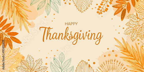 Autumn leaves and a happy thanksgiving greeting on a soft background