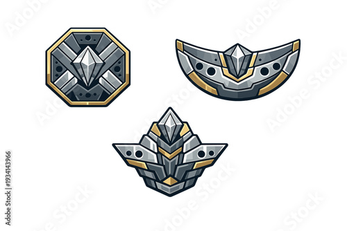 A set of three futuristic metallic rank icons or badges with silver and gold accents on a black background. The designs feature geometric shapes and crystalline centerpieces.