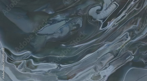 Moody abstract fluid art background featuring dark gray and black marble texture with smooth flowing swirls and organic patterns. Modern artistic backdrop with copy space.