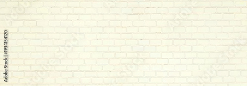 White painted brick wall texture with subtle vintage tones and uniform pattern. Clean architectural background ideal for interior design, branding, or urban backdrop use.