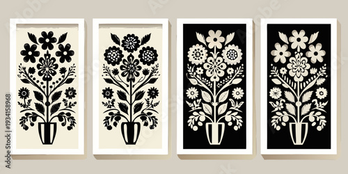 Four framed botanical prints displaying symmetrical floral arrangements in vases