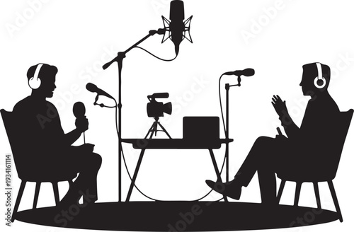 Two men in headphones sitting with microphones and camera