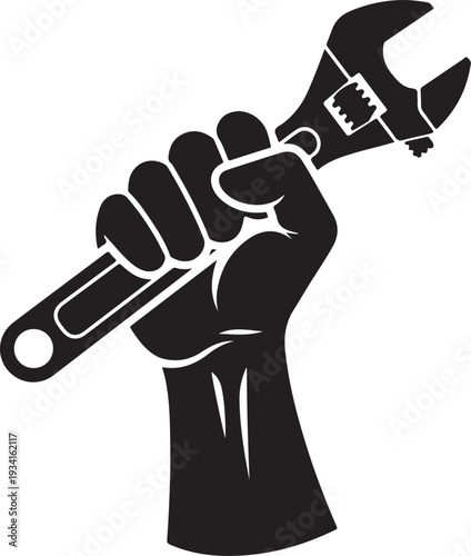 A strong fist gripping a large wrench symbolizing power and determination in manual labor.