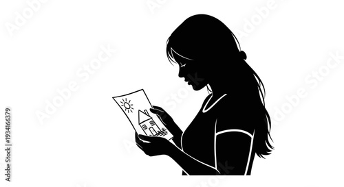 Woman reading a book or magazine in silhouette.