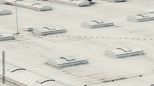 Cuadro en lienzo Industrial roof with multiple skylights for natural light