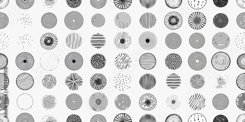 Abstract arrangement of various circular patterns in grayscale tones