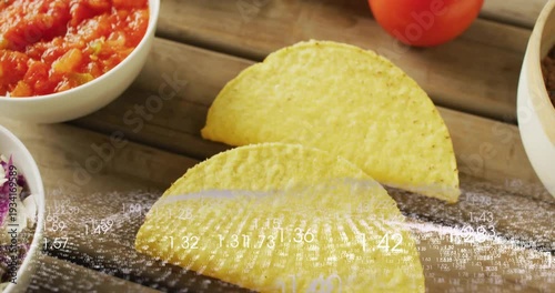 Numeric overlay sweeping, taco shells moving as salsa, lime, avocado appearing for product reveal