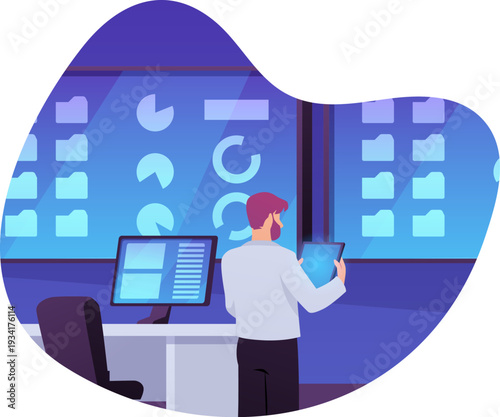 A man with a tablet near server equipment and a desktop in a data center.