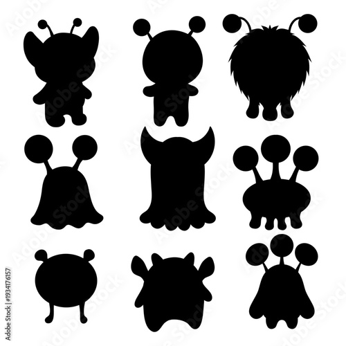 Vector set of black silhouette of alien clip arts. Collection of monochrome hand-drawn naive monsters