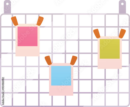 A hanging metal grid with Polaroid photos, an interior creative board.