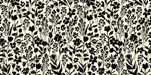 Intricate black floral pattern repeating on a cream colored background