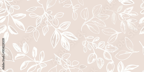 Delicate white floral branches and leaves on a blush pink background