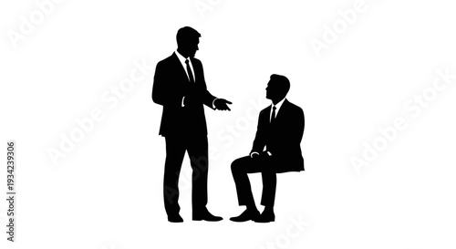Two Businessmen in Formal Attire Interacting.
