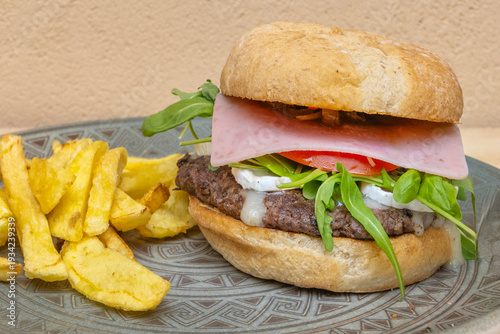  the umami of grilled beef, the richness and saltiness of Gouda cheese, the acidity and freshness of perfectly ripe tomatoes