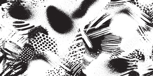 Black and white abstract background with energetic spray paint splatters and dynamic, textured brush strokes